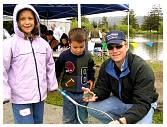 Kelesa and evan with dad.jpg